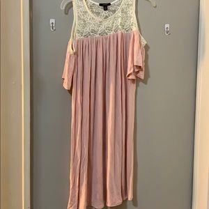 Off the shoulder baby pink dress.